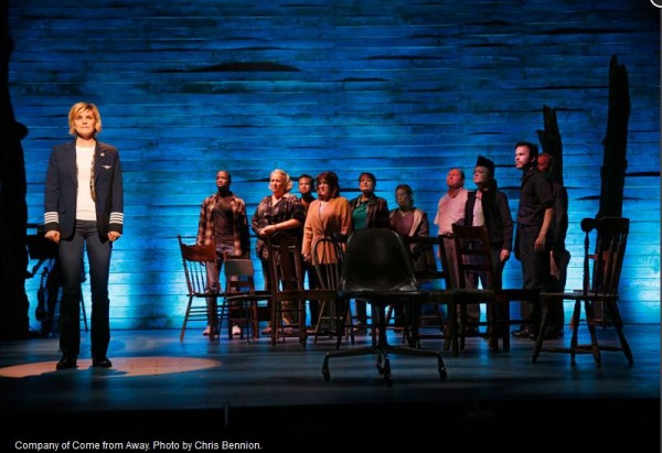 Jenn Colella, left, as Captain Beverley and the company of "Come From Away" the new musical at Seattle Repertory Theatre. Photo by Chris Bennion.