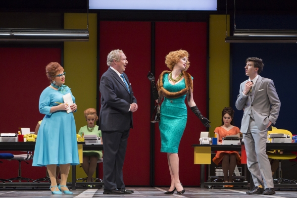 l-r Smitty (Sarah Rudinoff), Mr. Bratt (Jeff Steitzer), Hedy La Rue (Jessica Skerritt) and Bud Frump (Adam Standley) in How to Succeed in Business Without Really Trying at The 5th Avenue Theatre. Photo Credit Tacy Martin