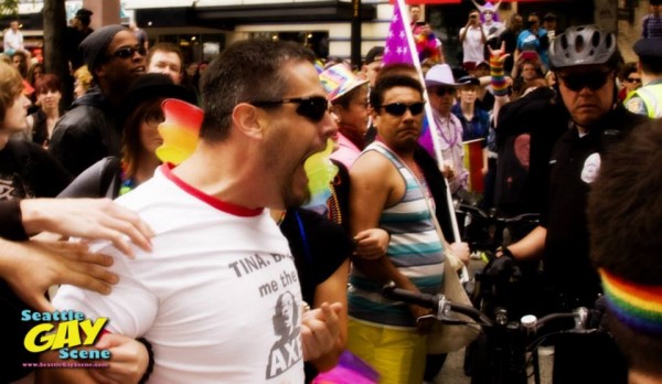 This outraged Seattle Pride goer was yelling at anti-LGBTQ protesters at the 2014 Seattle Pride Parade, but other local community members expressed themselves at a Seattle Pride community meeting on June 1, 2016 at Hotel Monaco to address concerns over Seattle Pride's recent communication problems. Photo: Mark Zimmerman for Seattle Gay Scene
