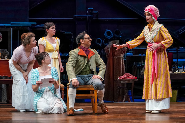 Emily Chisholm (Jane), Kjerstine Anderson (Lizzy), Hana Lass (Lydia), Rajeev Varma (Mr. Bennet), and Cheyenne Casebier (Mrs. Bennet) in Seattle Repertory Theatre’s production of Pride and Prejudice. Photo by Alan Alabastro.