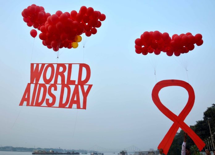 Kolkata: People participate during an AIDS awareness programme on the eve of World AIDS Day in Kolkata on Nov 30, 2016. (Photo: IANS)