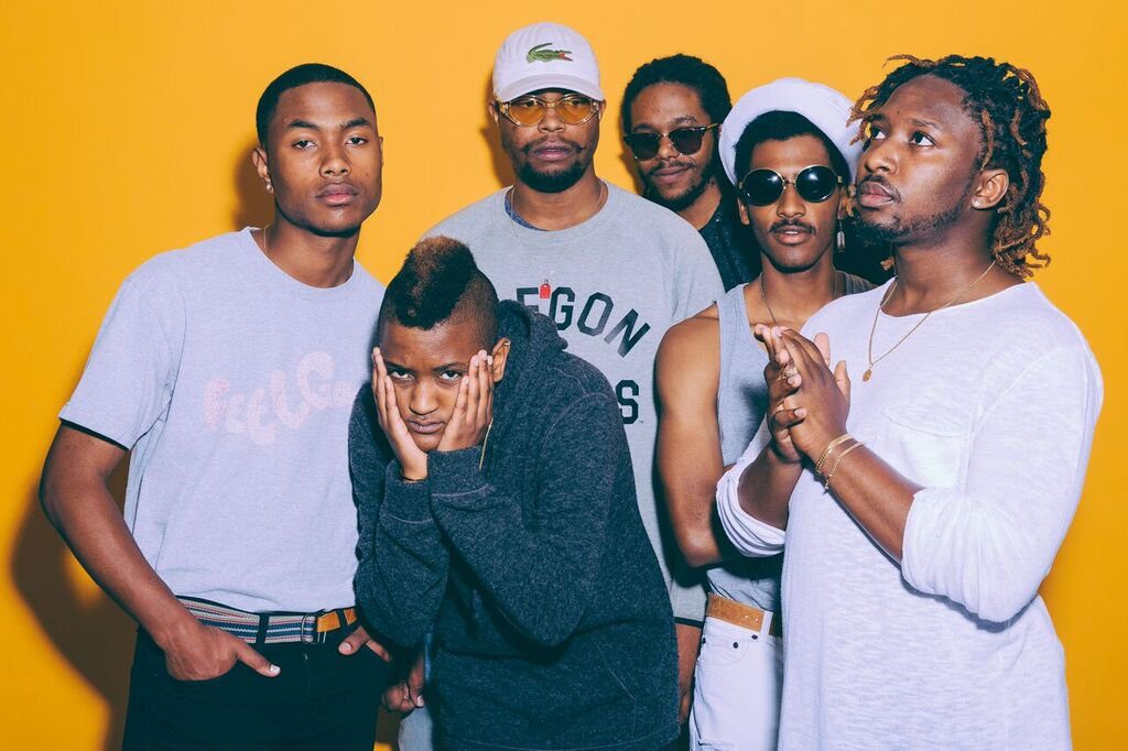 (left) Steve Lacy and Syd tha Kyd with The Internet bandmates