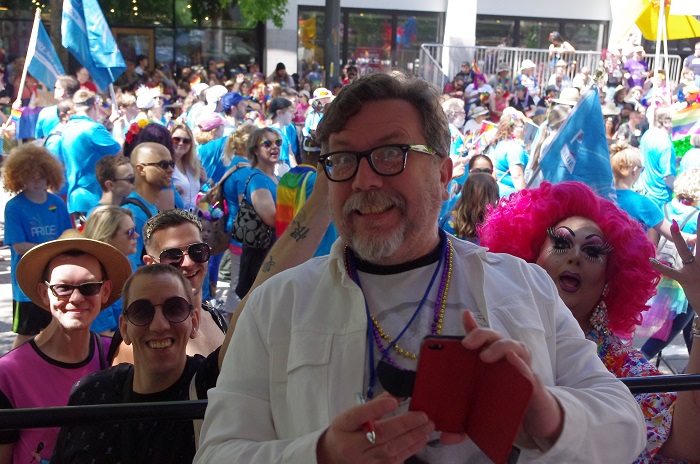 Michael Strangeways judging the 2018 Seattle Pride Parade with Mama Tits and her posse stopping by the booth. Photo: Ziggy in Seattle