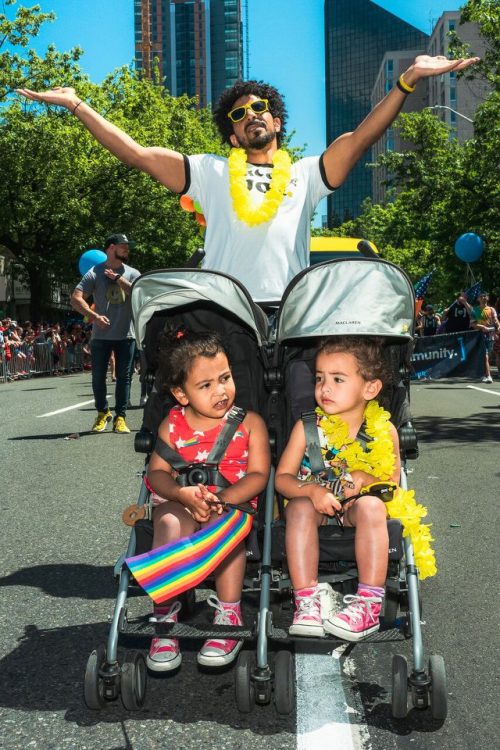 Families celebrating in the 2018 Seattle Pride Parade. Photo: Nate Gowdy
