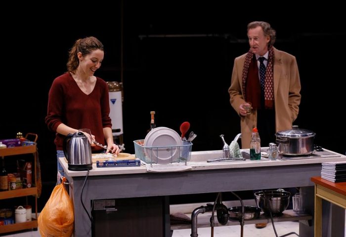 Elinor Gunn, making very bland pasta and Daniel Gerroll play adulterous lovers in ACT's production of David Hare's SKYLIGHT now through Sept 30, 2018.