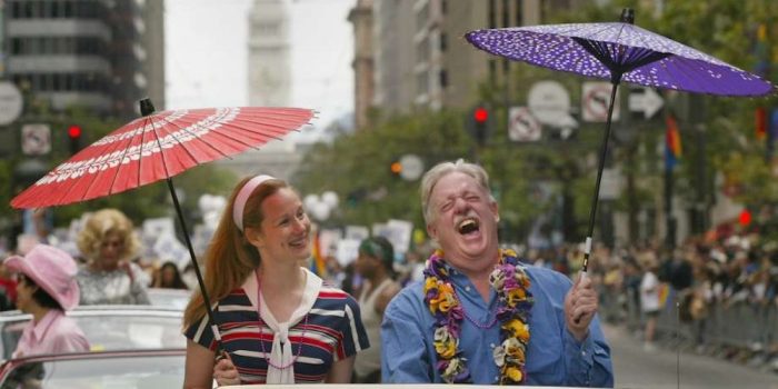 Star Laura Linney and author Armistead Maupin, pictured here from San Francisco Pride Parade circa...the early 90s, reunite for an  all-new "Tales of The City" series on Netflix for 2019.
