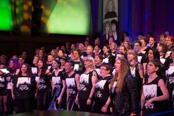 Seattle Women's Chorus in "Legends of Rock" Photo: Conrado Tapado of eQuality Images.