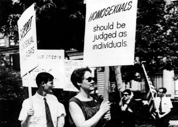Via Wikipedia: "Barbara Gittings (July 31, 1932 – February 18, 2007) was a prominent American activist for LGBT equality. She organized the New York chapter of the Daughters of Bilitis (DOB) from 1958 to 1963, edited the national DOB magazine The Ladder from 1963–66, and worked closely with Frank Kameny in the 1960s on the first picket lines that brought attention to the ban on employment of gay people by the largest employer in the US at that time: the United States government." Barbara Gittings picketing Independence Hall as part of an Annual Reminder on July 4, 1966; photo by Kay Lahusen.